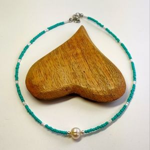 Beaded choker necklace with mother of pearl and seed beads